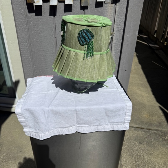 Pastel green custom made bucket hat with beaded patches.